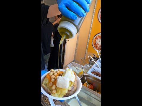 Filled Baked Potatoes Italian Style. Street Food