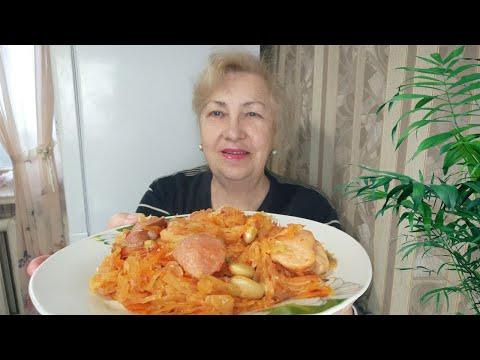 Как вкусно приготовить простую капусту с фасолью и с сосисками.